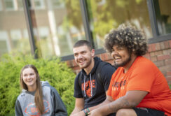 students outdoors as a group